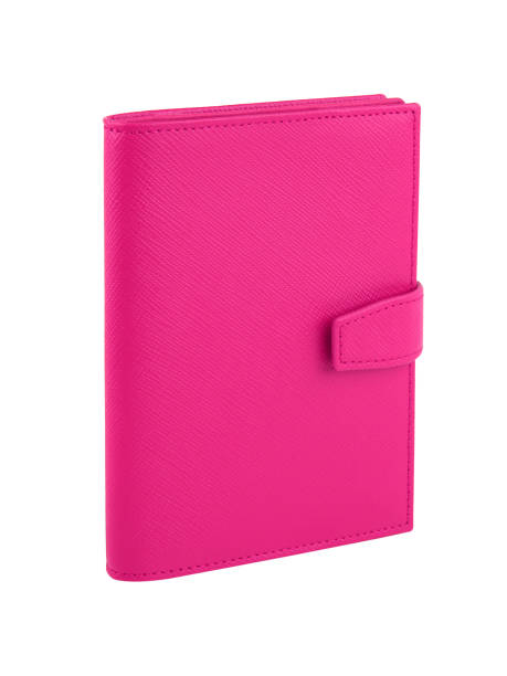 istock New pink wallet of genuine cattle leather. Isolated on white 1324829280