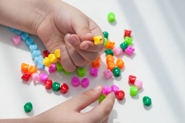 istock Kids activity to promote development, motor skills, thinking, coordination. 1324829454