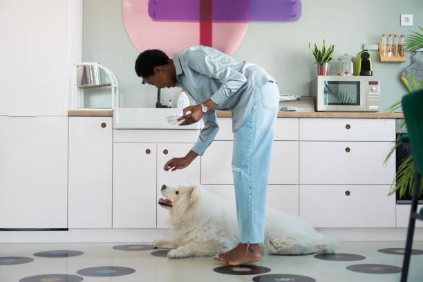 istock Happy single woman and her dog 1324830777
