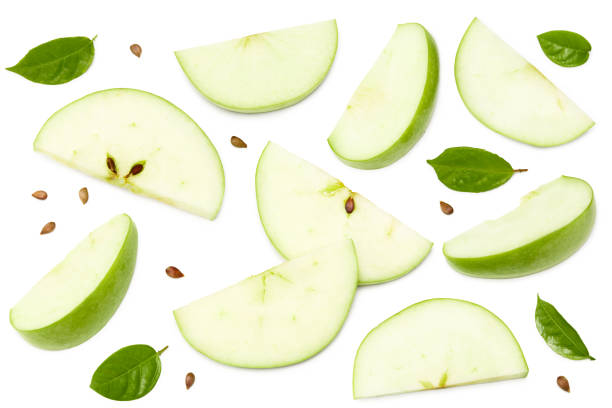 istock green apple with slices isolated on a white background. top view. clipping path 1324831589