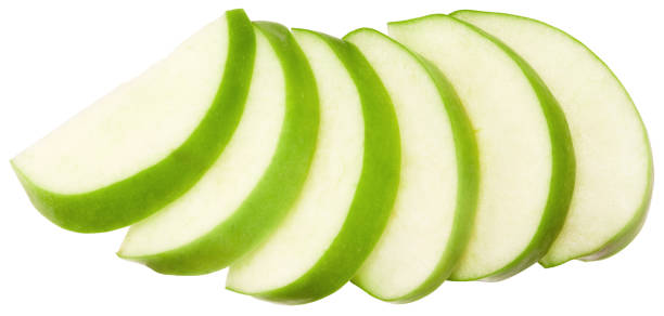 istock piece of green apple isolated on white background. clipping path 1324831599