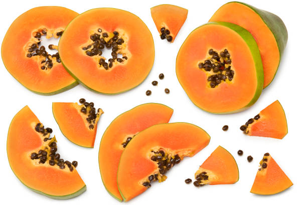 istock sliced ripe papaya fruit isolated on white background. exotic fruit. clipping path. top view 1324831662