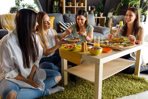 istock Enjoying a pizza together and sharing a ketchup 1324831840