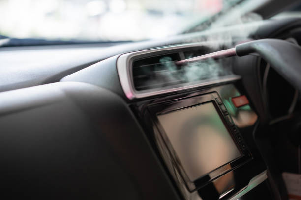 istock Asian man worker cleaning  a car. 1324834428