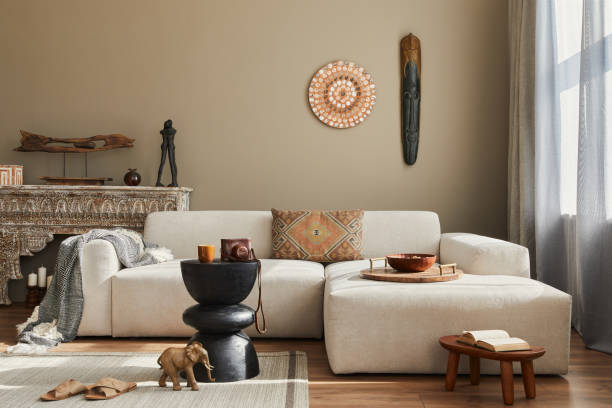 istock Stylish ethnic living room interior with design modular sofa. 1324839959