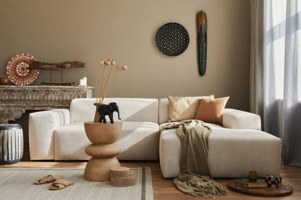 istock Stylish ethnic living room interior with design modular sofa. 1324839997