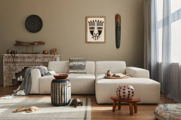 istock Stylish ethnic living room interior with design modular sofa. 1324840086