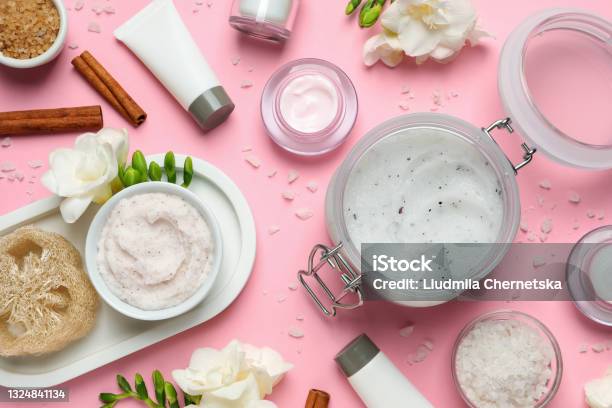 Flat Lay Composition With Body Scrubs On Pink Background Stock Photo - Download Image Now