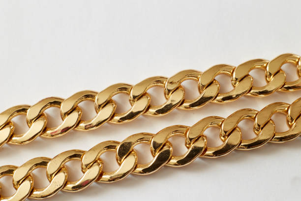 istock gold chain on white background close-up, wealth luxury 1324841178