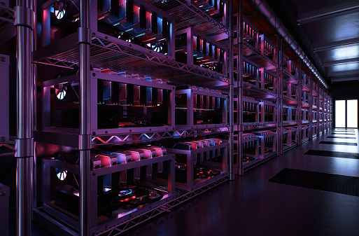 Inside a data center for cryptocurrency mining with endless racks of CPU and motherboards. Processing the exchange of digital coins.