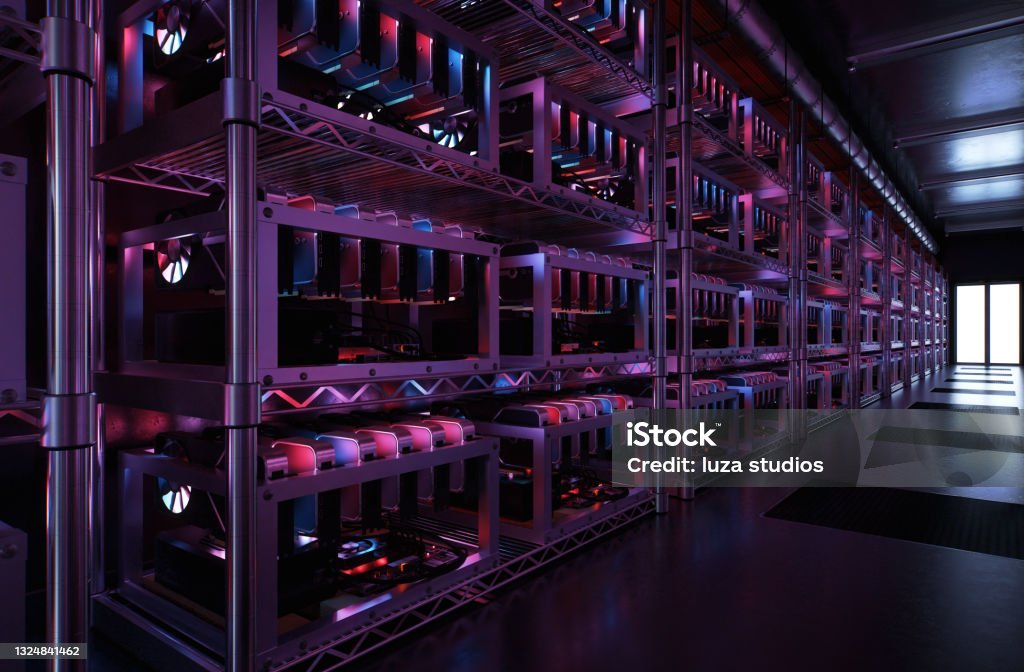 Cryptocurrency mining rigs in a data center Inside a data center for cryptocurrency mining with endless racks of CPU and motherboards. Processing the exchange of digital coins. Cryptocurrency Mining Stock Photo