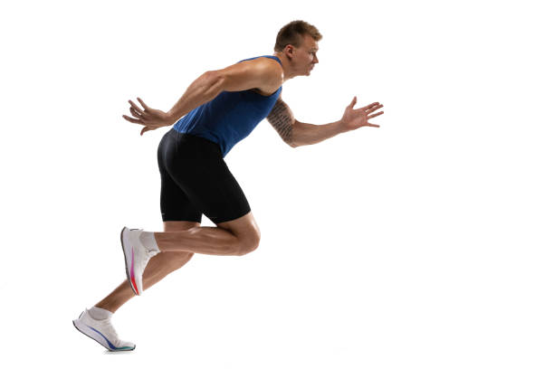 istock Caucasian professional male athlete, runner training isolated on white studio background. Muscular, sportive man. 1324841782