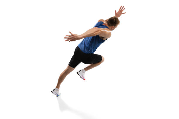 istock Caucasian professional male athlete, runner training isolated on white studio background. Muscular, sportive man. Concept of action, motion, youth, healthy lifestyle. Copyspace for ad. 1324842305