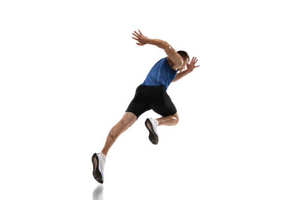 istock Caucasian professional male athlete, runner training isolated on white studio background. Muscular, sportive man. Concept of action, motion, youth, healthy lifestyle. Copyspace for ad. 1324842317