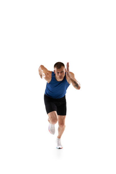 istock Caucasian professional male athlete, runner training isolated on white studio background. Muscular, sportive man. Concept of action, motion, youth, healthy lifestyle. Copyspace for ad. 1324842332