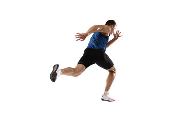 istock Caucasian professional male athlete, runner training isolated on white studio background. Muscular, sportive man. Concept of action, motion, youth, healthy lifestyle. Copyspace for ad. 1324842346