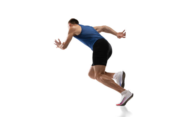 istock Caucasian professional male athlete, runner training isolated on white studio background. Muscular, sportive man. Concept of action, motion, youth, healthy lifestyle. Copyspace for ad. 1324842387