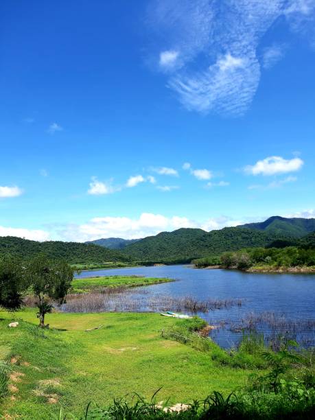 istock The camping ground, Ratchaburi, Thailand. landscape with mountains, forest, and a river in front. beautiful scenery. 1324845215