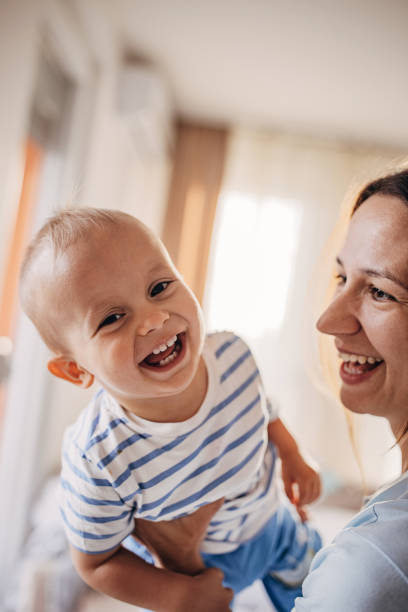 istock Mother and son playing at home 1324845637