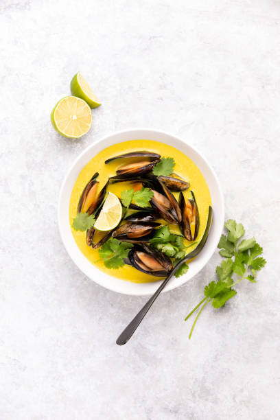 istock Mussels in coconut cream curry sauce, top down view 1324846952