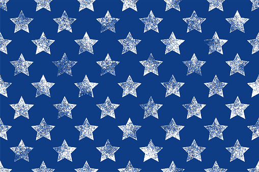 Seamless pattern with rubber stamp stars. Texture design elements on a blue background.