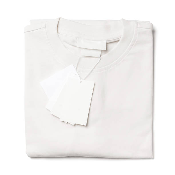 istock T-shirt with  blank paper labels on white background 1324847278
