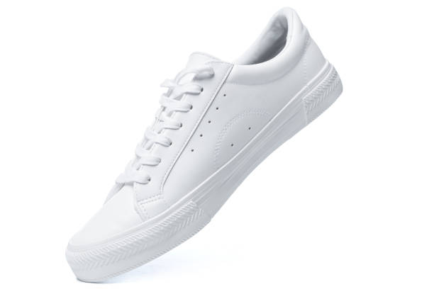 Trainers - white leather shoe on white background