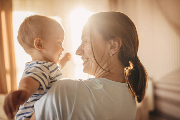 istock Mother and son at home 1324848367