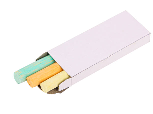 istock Colored crayons in a white box on a white background, isolated image 1324848604