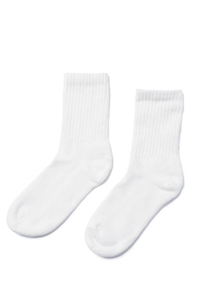 istock White cotton socks on white background 1324849134
