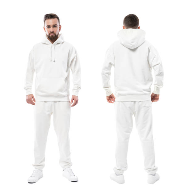 istock Handsome man wearing blank white hoodie and pants on white background 1324850749