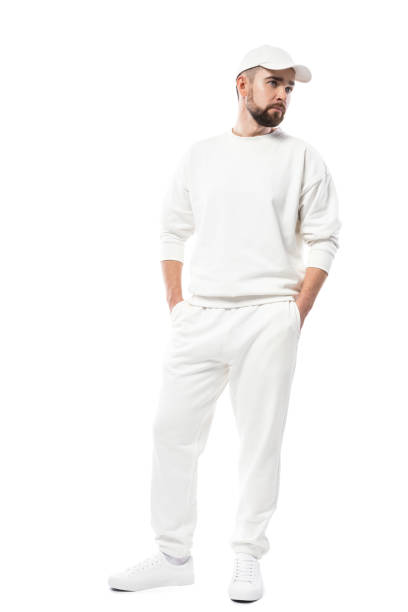 istock Handsome man wearing white clothes on white background 1324851880