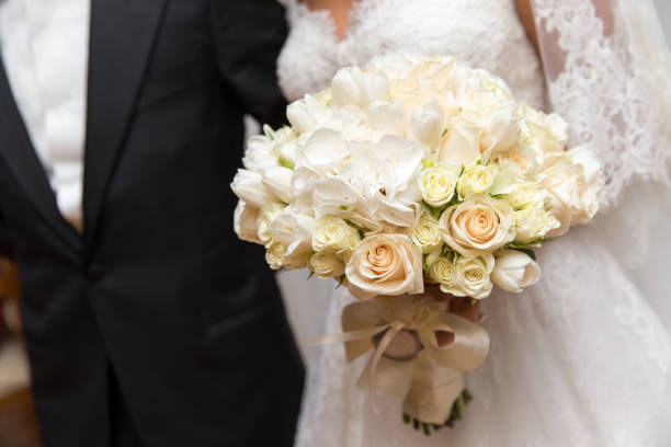 istock Wedding bouquet in brides hands 1324852324