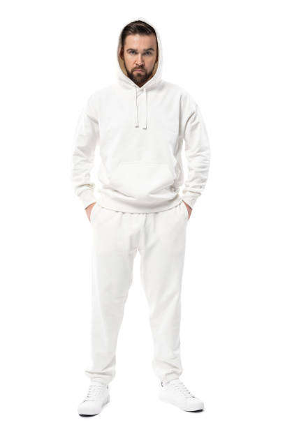 istock Handsome man wearing blank white hoodie and pants on white background 1324852337