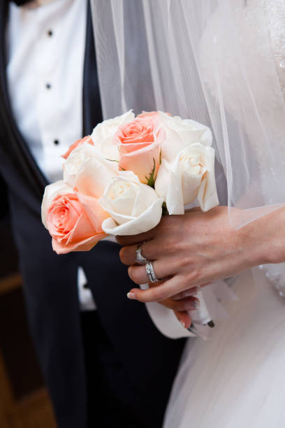 istock Wedding bouquet in brides hands 1324852446