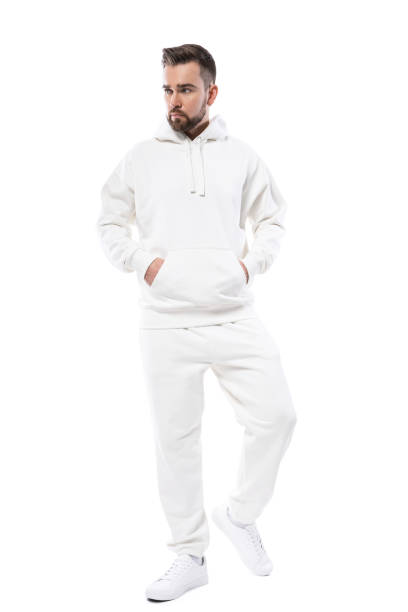 istock Handsome man wearing blank white hoodie and pants on white background 1324852486