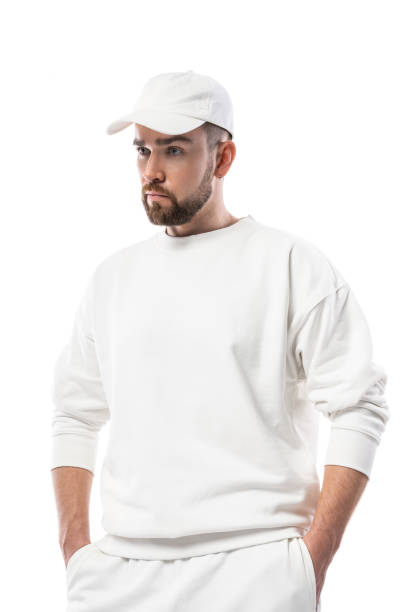 istock Handsome man wearing blank white cap on white background 1324853151