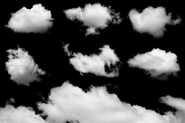 istock Set of isolated clouds on black background. 1324853519