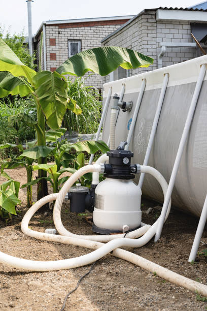 istock Sand filter plant at a pool in the garden 1324853525