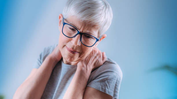 istock Senior Woman with Shoulder Pain 1324854448