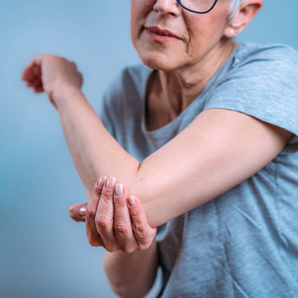 istock Senior Woman with Painful Elbow. 1324857020
