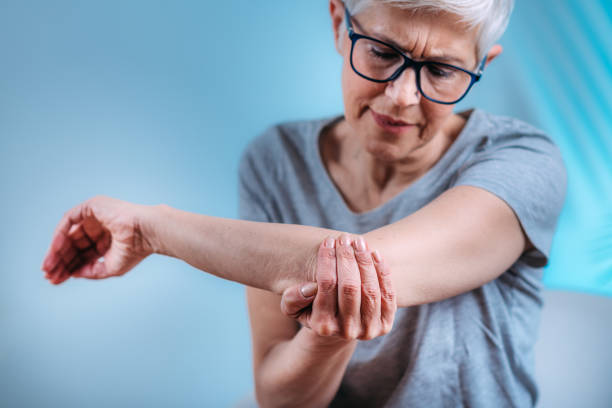 istock Senior Woman with Painful Elbow. 1324857052