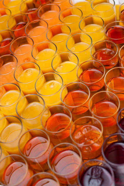 istock Many various juice in glasses at event 1324857514