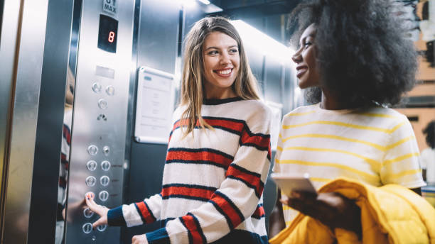 34,500+ People In Elevator Stock Photos, Pictures & Royalty-Free Images - iStock | Two people in elevator, People in elevator icon, Business people in elevator