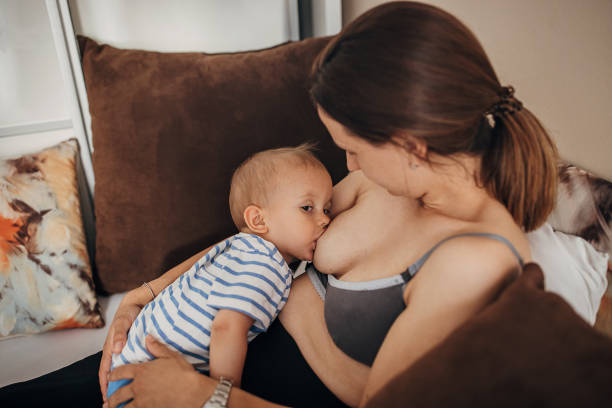 istock Mother breastfeeding her baby boy 1324858712