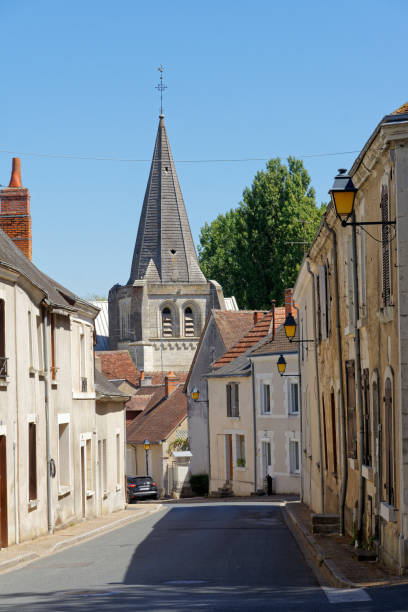 istock Narrow street with a church tower. 1324859090
