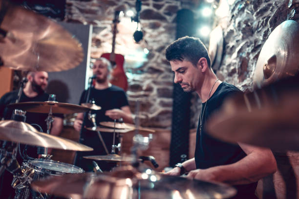 istock Modern Drummer And His Band Recording A New Song 1324859906