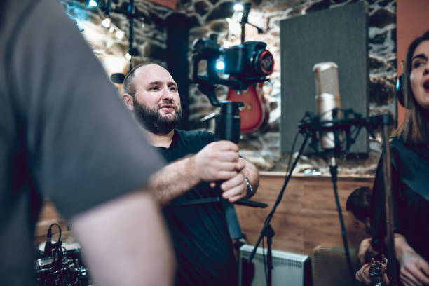istock Bearded Male Recording Band's New Music Video 1324860077