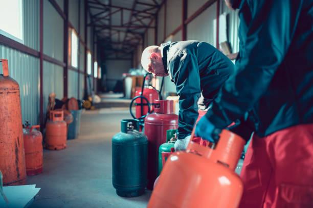 istock Modern Workers In Gas Cylinder Storage Checking Cylinder Condition 1324862462