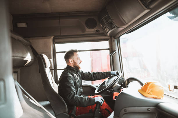 istock Smiling Truck Driver Ready For His Journey 1324862583